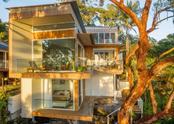 a house with a tree in the background