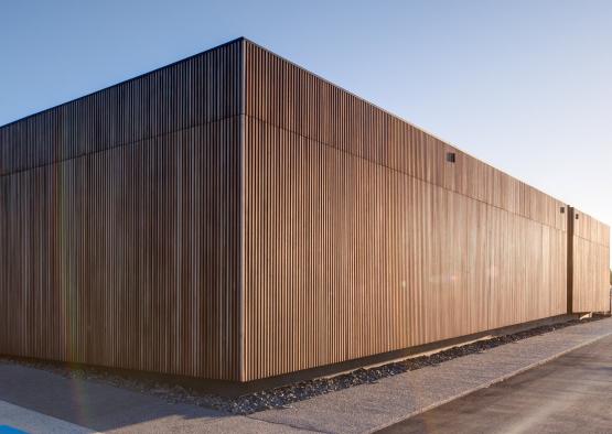 a building with a wooden wall