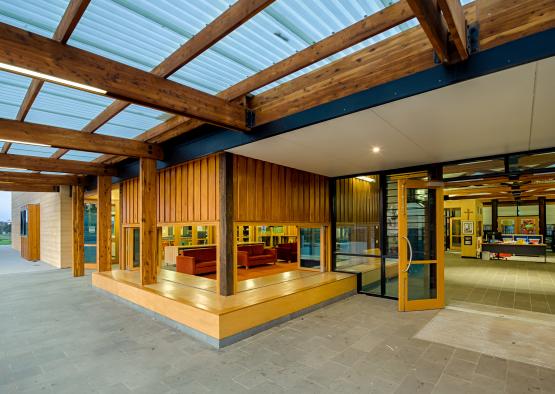 a building with glass doors and a glass roof