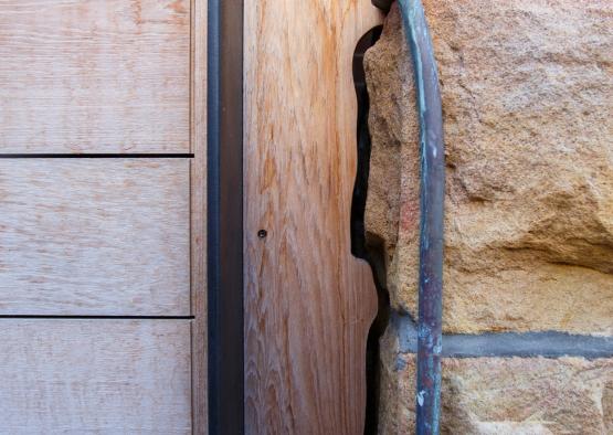 a pipe in a stone wall