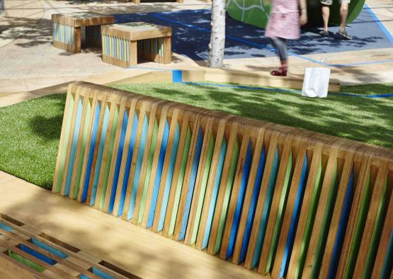 a wooden bench in a park