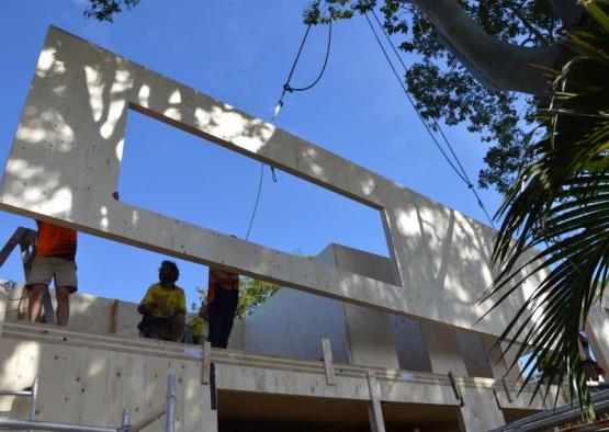 a group of men working on a building