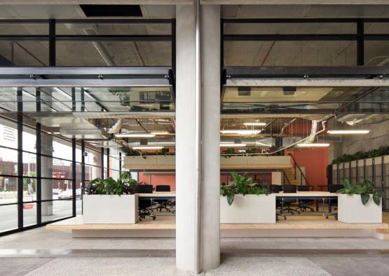 a glass wall with a large window