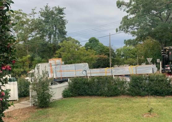 a truck carrying goods on a trailer