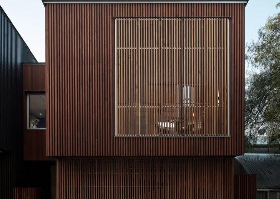 a building with a wood paneled wall