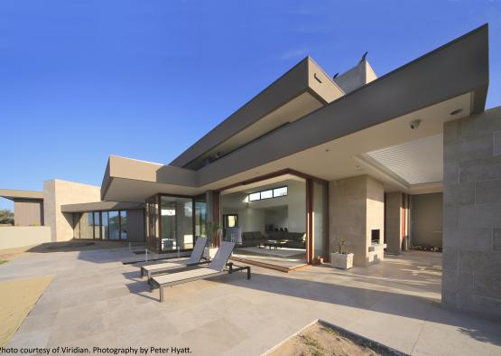 a house with a patio and chairs