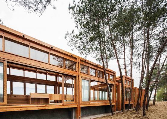 a building with trees in the background