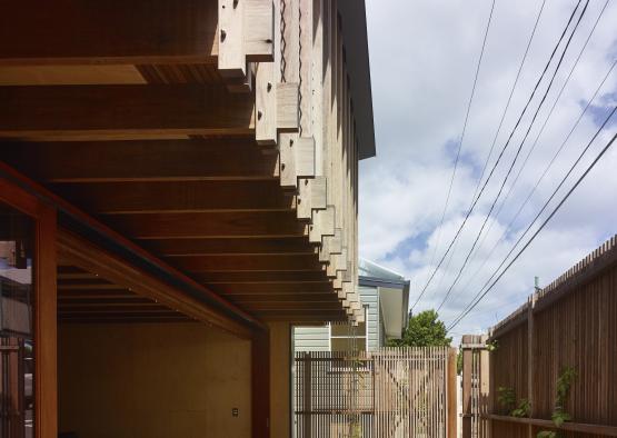 a fenced yard with a wooden fence and a wooden fence