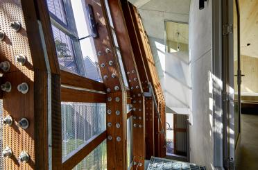 a staircase with a metal cage