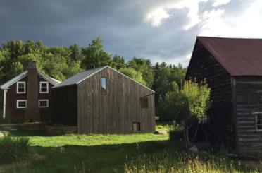 a group of buildings in a field